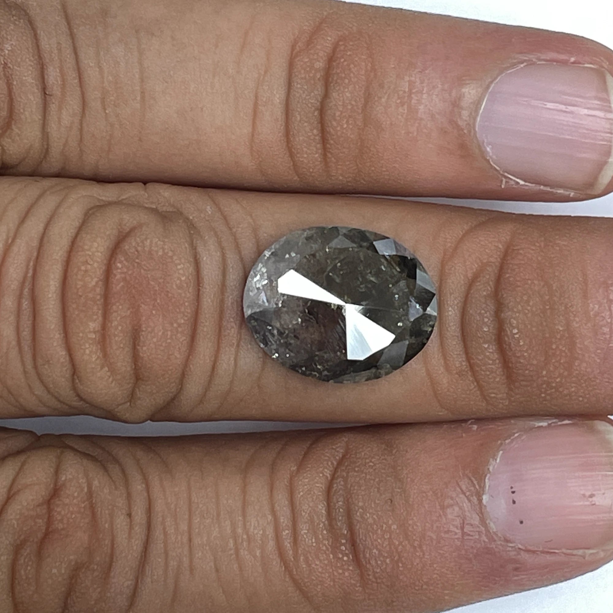 Oval Cut Salt And Pepper Diamond 